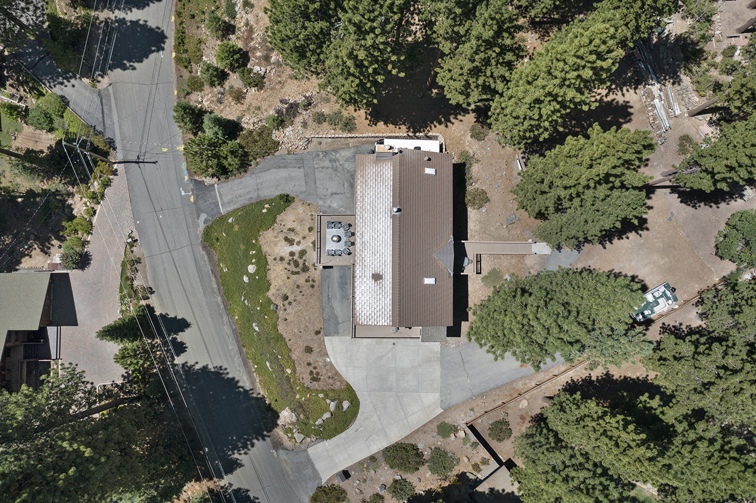 Aerial view of Kinpine House, its heated driveway and the surrounding Incline Village forest