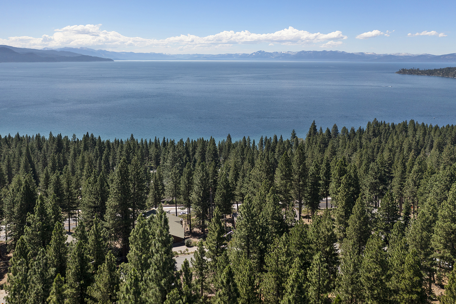Aerial view over the Incline Village pines to Lake Tahoe on a clear day